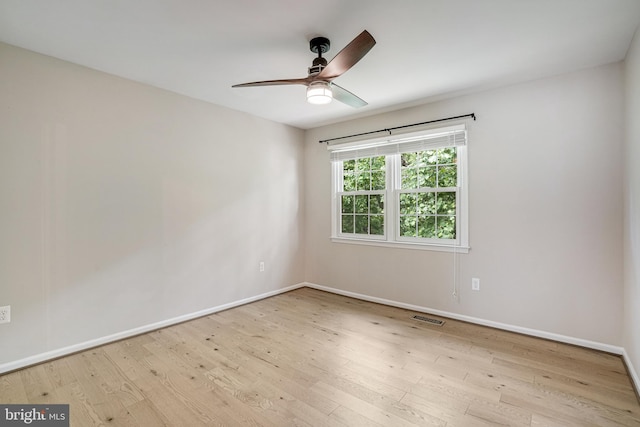 5926 Clermont Landing Ct, Burke, VA 22015 - empty room featuring wood finished floors, ceiling fan, and baseboards