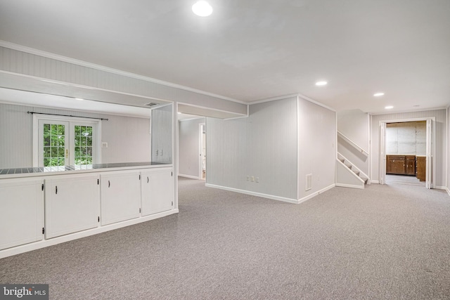 5926 Clermont Landing Ct, Burke, VA 22015 - empty room with stairs, ornamental molding, light carpet, baseboards, and recessed lighting