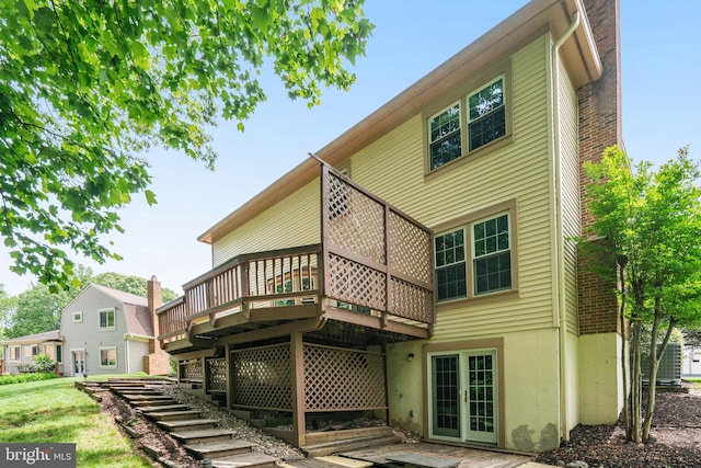 5926 Clermont Landing Ct, Burke, VA 22015 - back of property featuring a wooden deck and a yard