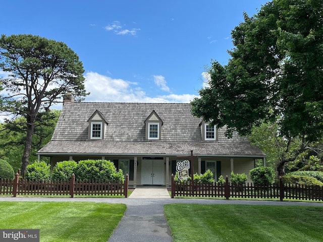 5926 Clermont Landing Ct, Burke, VA 22015 - cape cod home with a chimney and a porch