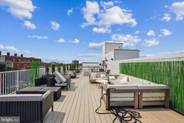 625 Slaters Ln Unit 407, Alexandria, VA 22314 - wooden terrace with an outdoor living space