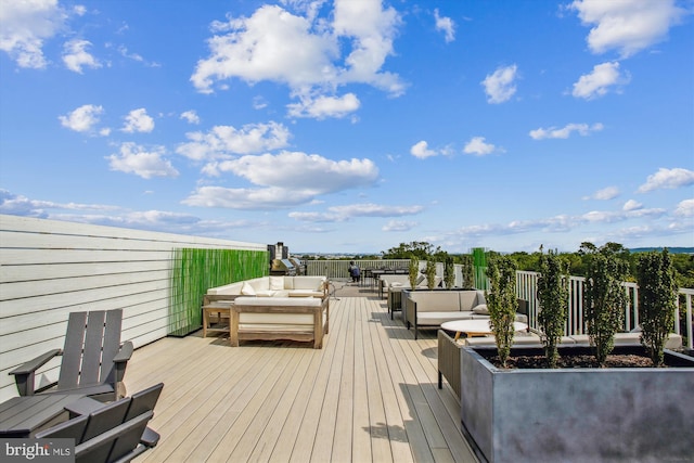 625 Slaters Ln Unit 407, Alexandria, VA 22314 - wooden terrace featuring an outdoor hangout area