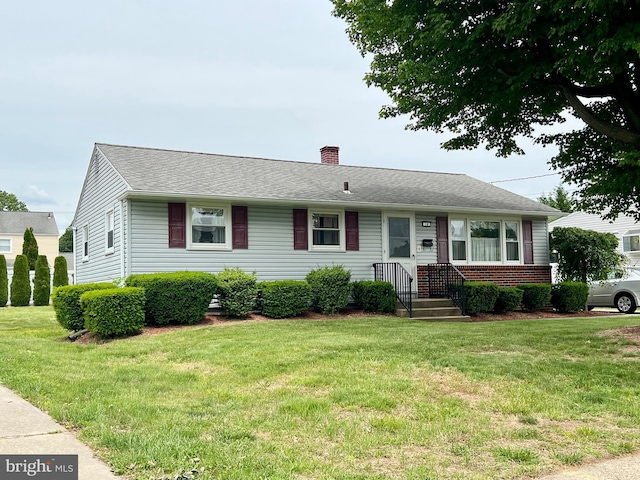 18 Jamaica Way, Hamilton, NJ 08610 - view of front of home featuring a front lawn, a chimney, and brick siding