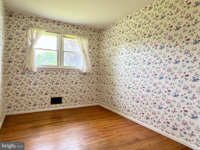 18 Jamaica Way, Hamilton, NJ 08610 - unfurnished room featuring light wood-style flooring, wallpapered walls, and baseboards