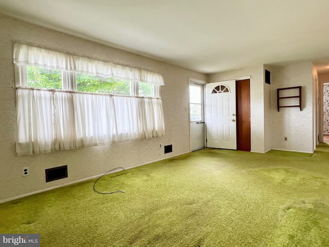18 Jamaica Way, Hamilton, NJ 08610 - unfurnished living room featuring carpet floors, baseboards, and a textured wall