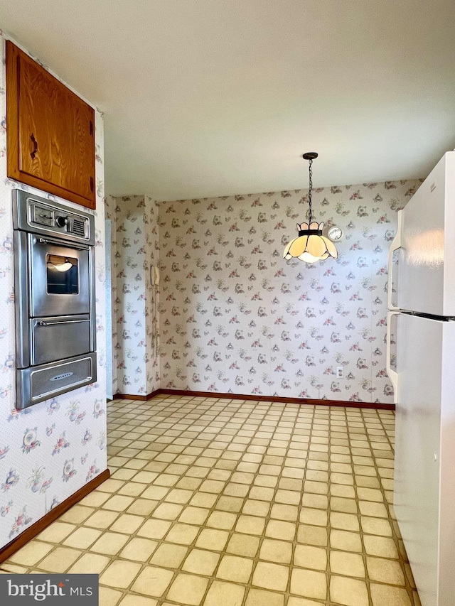 18 Jamaica Way, Hamilton, NJ 08610 - kitchen with freestanding refrigerator, oven, wallpapered walls, baseboards, and a warming drawer