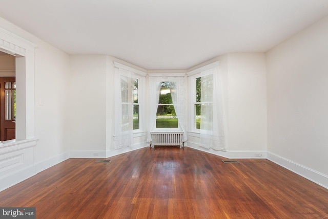 2806 Northumberland Hwy, Lottsburg, VA 22511 - unfurnished room featuring radiator heating unit, hardwood / wood-style floors, and baseboards