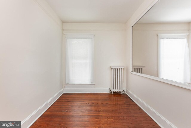 2806 Northumberland Hwy, Lottsburg, VA 22511 - spare room featuring radiator, wood finished floors, and baseboards