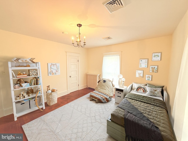 2806 Northumberland Hwy, Lottsburg, VA 22511 - bedroom with a chandelier, wood finished floors, and baseboards