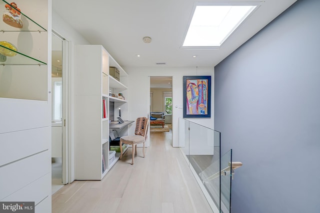 1448 Corcoran St NW, Washington, DC 20009 - corridor featuring a skylight, light wood-type flooring, and recessed lighting