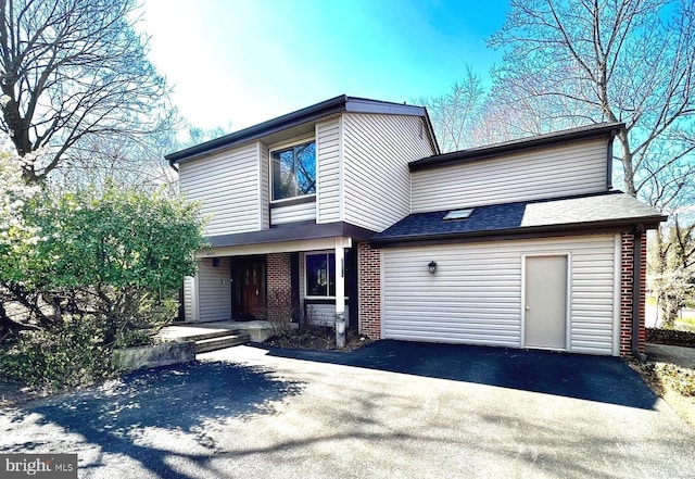 20138 Wynnfield Dr, Germantown, MD 20874 - view of front of property with driveway, brick siding, and a shingled roof