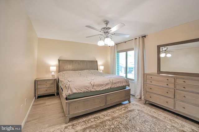 20138 Wynnfield Dr, Germantown, MD 20874 - bedroom featuring light wood-style floors, baseboards, and a ceiling fan
