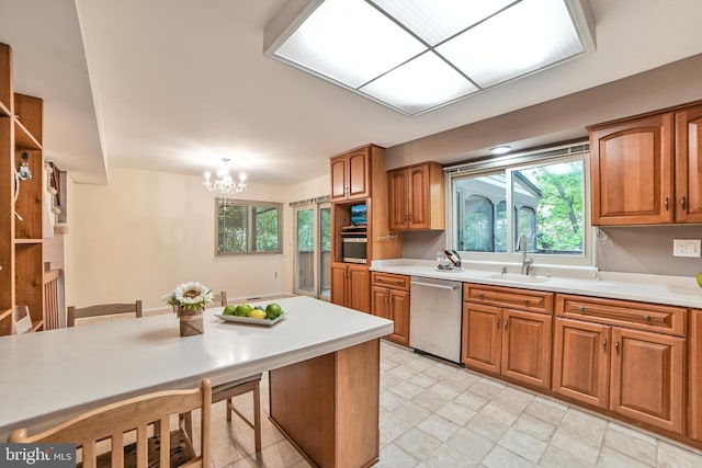 20138 Wynnfield Dr, Germantown, MD 20874 - kitchen featuring dishwasher, brown cabinets, and light countertops