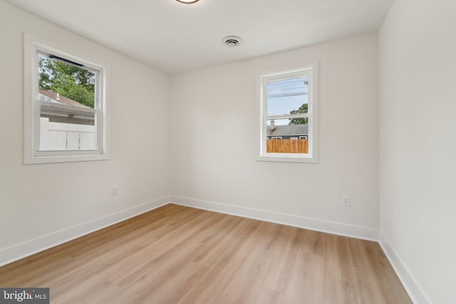 818 Dale Rd, Glen Burnie, MD 21060 - empty room featuring light wood-type flooring and baseboards