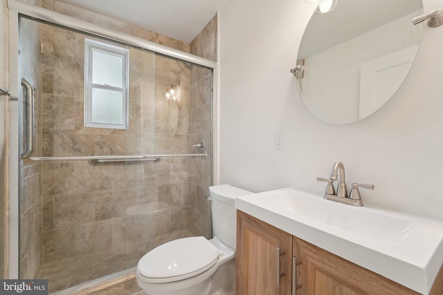 818 Dale Rd, Glen Burnie, MD 21060 - full bathroom featuring toilet, a shower stall, and vanity