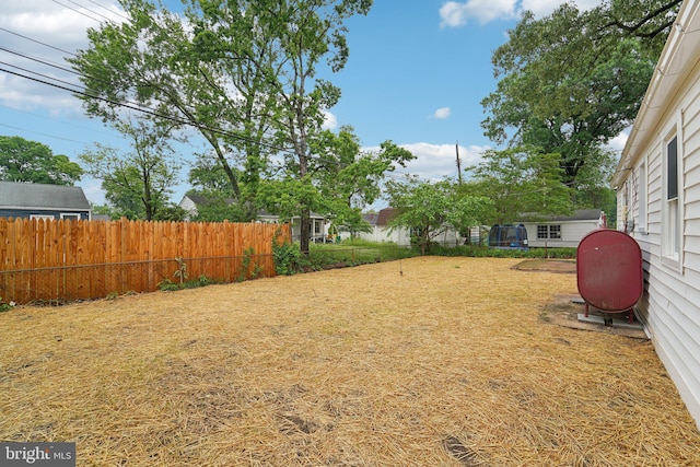 818 Dale Rd, Glen Burnie, MD 21060 - view of yard with oil tank and fence