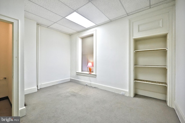 476 W Market St, York, PA 17401 - unfurnished bedroom featuring carpet, baseboards, and a drop ceiling