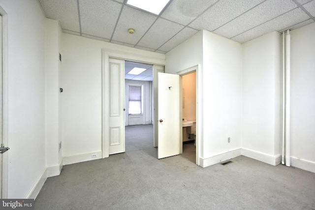 476 W Market St, York, PA 17401 - carpeted spare room with baseboards, a drop ceiling, and a smoke detector