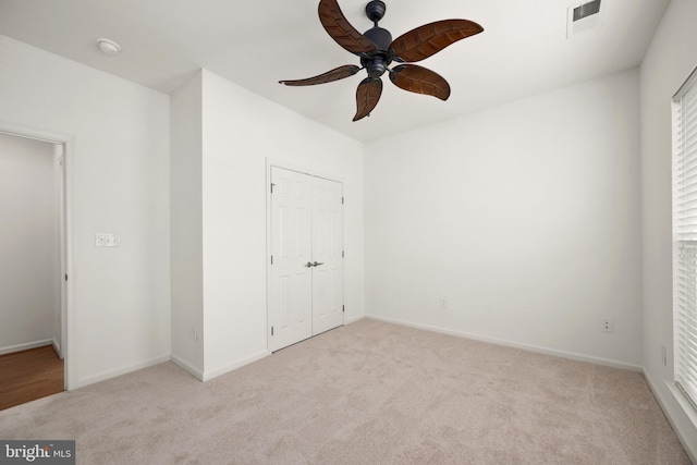 54 Ruddy Duck Ln, Bridgeville, DE 19933 - unfurnished bedroom with carpet floors, baseboards, ceiling fan, and a closet