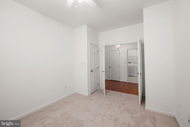 54 Ruddy Duck Ln, Bridgeville, DE 19933 - unfurnished bedroom featuring independent washer and dryer, carpet flooring, baseboards, and ceiling fan