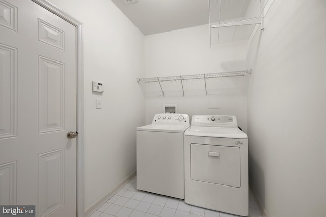 54 Ruddy Duck Ln, Bridgeville, DE 19933 - washroom with washer and dryer, baseboards, and light tile patterned floors