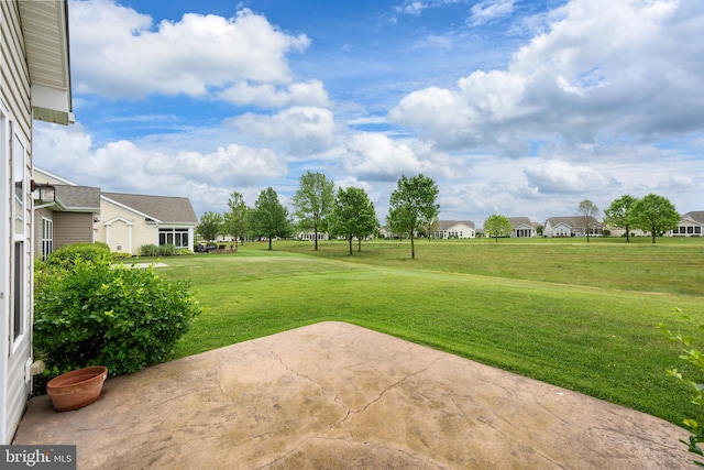 54 Ruddy Duck Ln, Bridgeville, DE 19933 - view of green lawn with a patio and a residential view