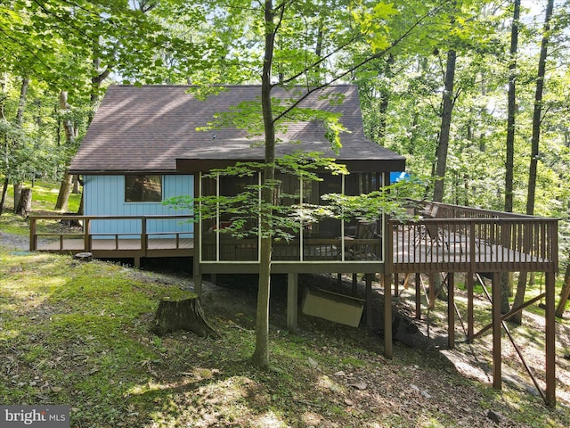 239 Onondaga Trl, Hedgesville, WV 25427 - rear view of property featuring a shingled roof and a deck