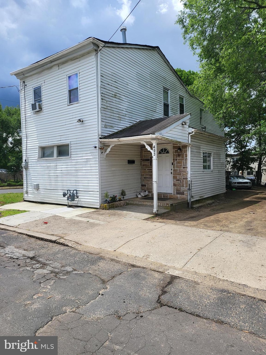 403N 29th St, Camden, NJ 08105 - view of front of property featuring a porch and cooling unit