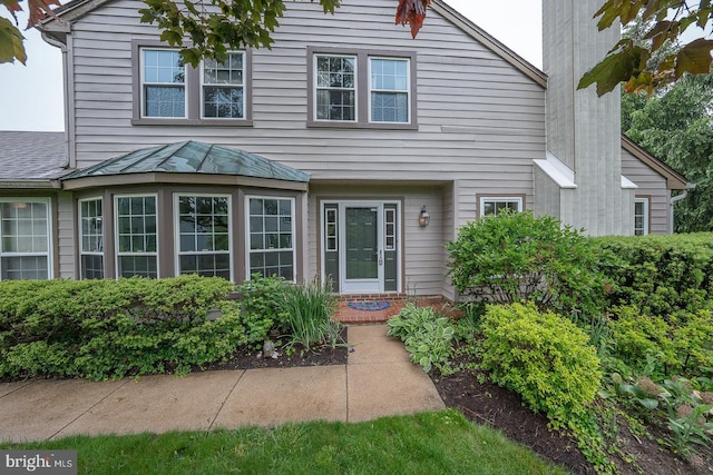 27 Manchester Ct Unit 27, Berwyn, PA 19312 - view of front of home with a chimney