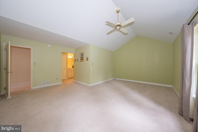 27 Manchester Ct Unit 27, Berwyn, PA 19312 - bonus room with a ceiling fan, light carpet, lofted ceiling, and baseboards