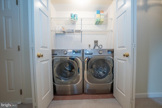 27 Manchester Ct Unit 27, Berwyn, PA 19312 - washroom with washing machine and dryer, tile patterned flooring, and baseboards