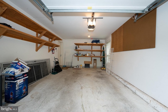27 Manchester Ct Unit 27, Berwyn, PA 19312 - garage featuring a garage door opener