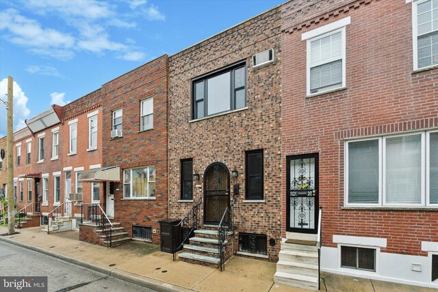 1142 Tree St, Philadelphia, PA 19148 - view of front facade with brick siding and entry steps