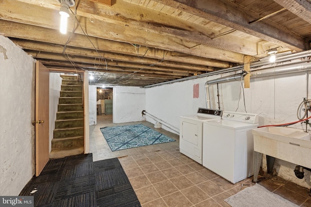 1142 Tree St, Philadelphia, PA 19148 - unfinished basement with washer and dryer, stairs, a sink, and tile patterned flooring