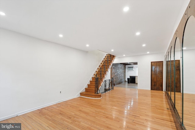 1142 Tree St, Philadelphia, PA 19148 - unfurnished living room featuring light wood-style floors, stairway, recessed lighting, and baseboards
