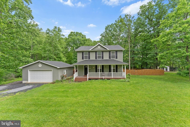 308 Fawn Dr, Winchester, VA 22602 - view of front of home with covered porch, an outbuilding, a detached garage, and roof with shingles