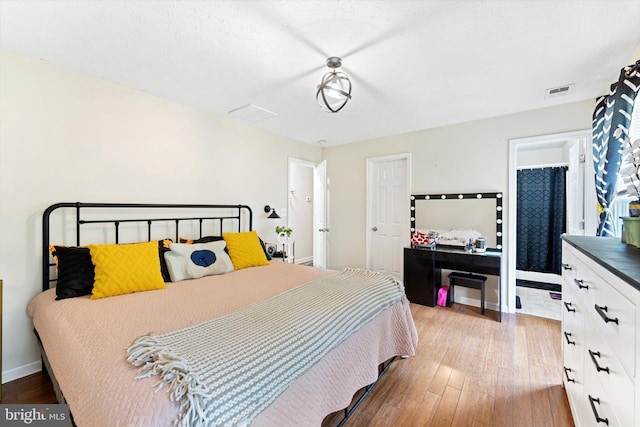 308 Fawn Dr, Winchester, VA 22602 - bedroom with baseboards and wood finished floors
