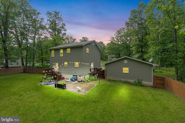 308 Fawn Dr, Winchester, VA 22602 - rear view of house with a patio, a wooden deck, stairs, and view of wooded area