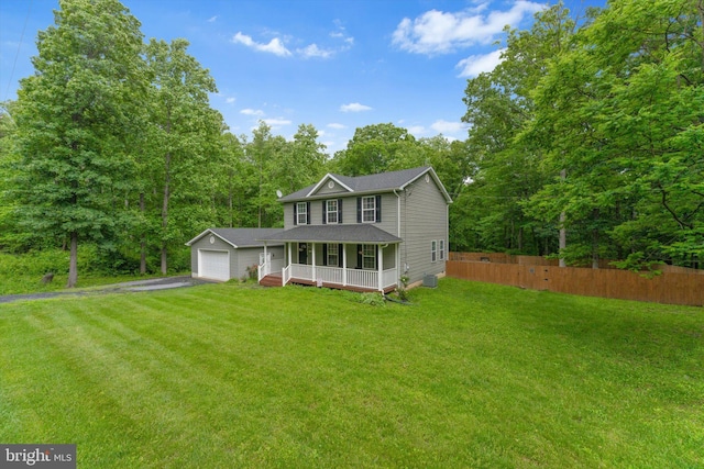 308 Fawn Dr, Winchester, VA 22602 - view of front of house featuring asphalt driveway, a porch, an attached garage, and cooling unit