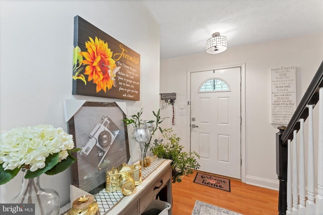 308 Fawn Dr, Winchester, VA 22602 - entrance foyer with light wood-style flooring and stairs