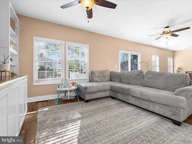 7827 Catherine Ave, Pasadena, MD 21122 - living room featuring ceiling fan and wood finished floors