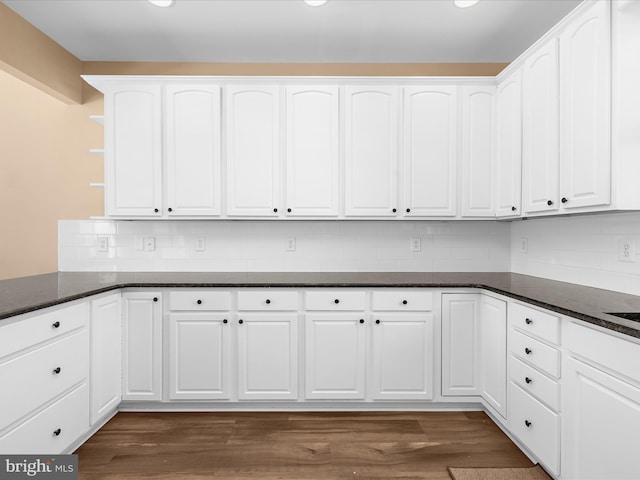 7827 Catherine Ave, Pasadena, MD 21122 - kitchen with open shelves, decorative backsplash, and dark wood-type flooring