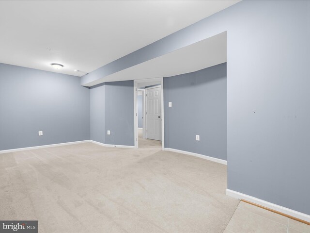 7827 Catherine Ave, Pasadena, MD 21122 - finished below grade area featuring baseboards and light carpet
