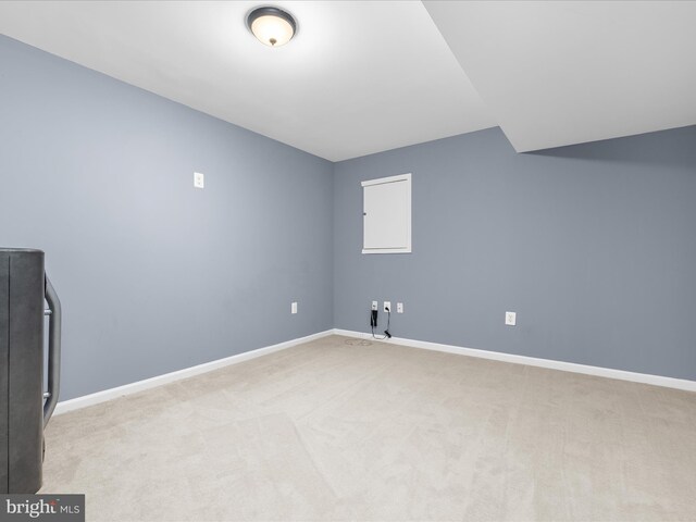 7827 Catherine Ave, Pasadena, MD 21122 - additional living space with light carpet and baseboards