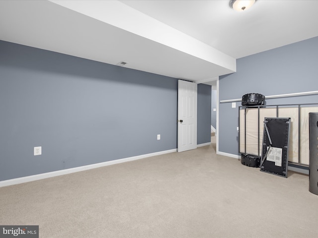 7827 Catherine Ave, Pasadena, MD 21122 - exercise room featuring carpet flooring and baseboards