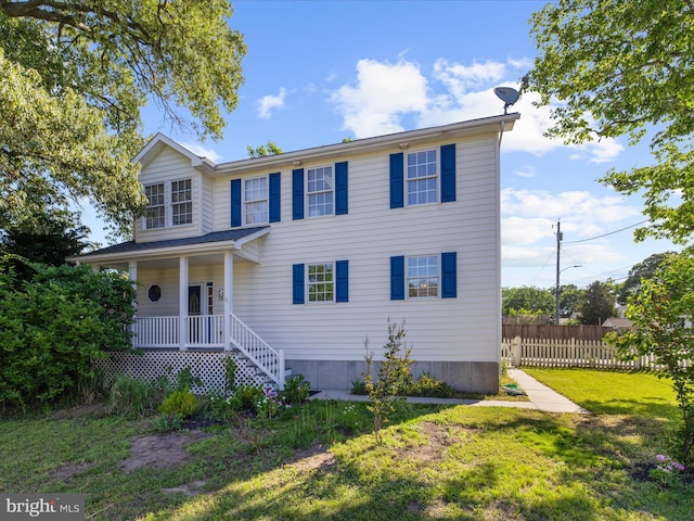 7827 Catherine Ave, Pasadena, MD 21122 - traditional-style home featuring a porch
