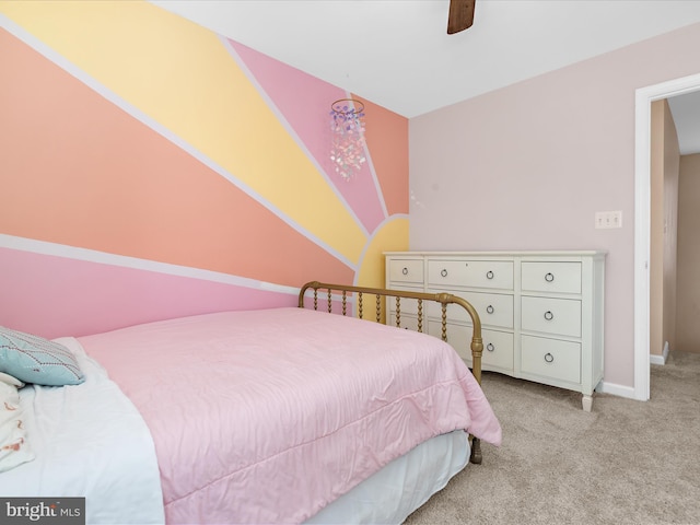 7827 Catherine Ave, Pasadena, MD 21122 - bedroom with light colored carpet and a ceiling fan