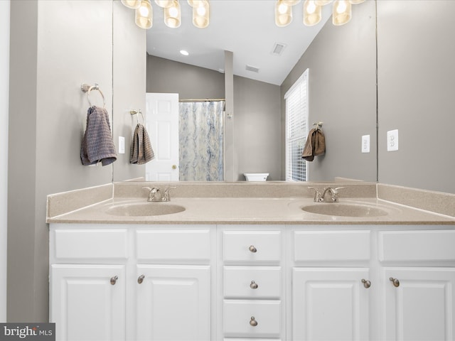 7827 Catherine Ave, Pasadena, MD 21122 - full bathroom with vaulted ceiling, double vanity, and curtained shower