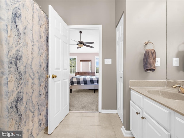 7827 Catherine Ave, Pasadena, MD 21122 - full bath with vanity, ceiling fan, tile patterned flooring, connected bathroom, and a shower with shower curtain