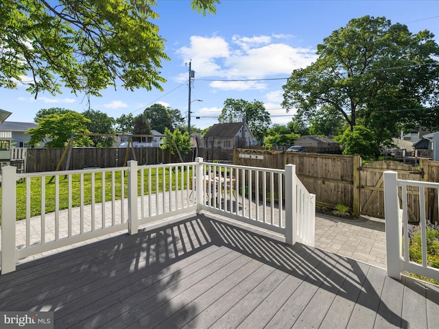 7827 Catherine Ave, Pasadena, MD 21122 - wooden terrace featuring a fenced backyard